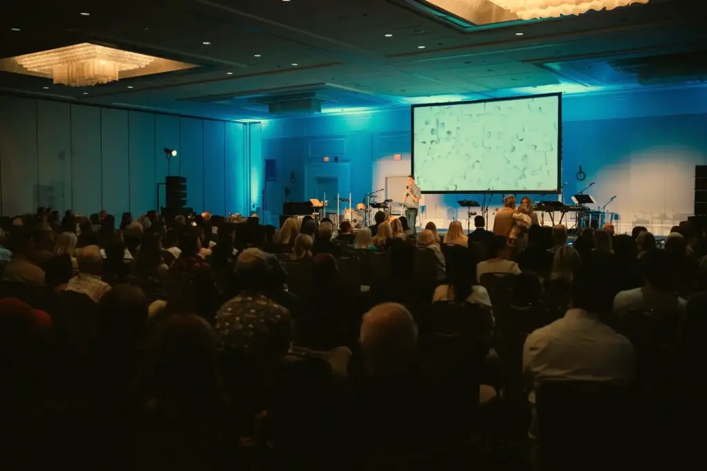 A Sunday gathering at Trinity: the room listens as the message begins